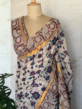 Pure Chennuri Silk Kalamkari Saree with Pichwai Florals & Peacock Pallu – Ivory, Purple & Maroon Border