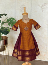 Thendral - Kids A-Line Dress With Kolam Embroidery & Sungudi Border