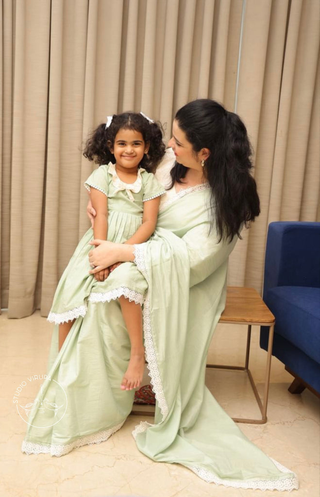 Mom and daughter in matching blue Gulabi sets for a wedding, Studio Virupa
