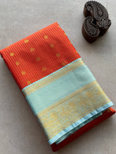 Deep Orange Semi Kanchi Silk Saree with Mint Zari Border