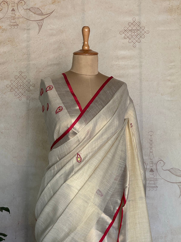 Jivika - Ivory Pure Linen Saree with Hand Embroidery & Red Selvedge