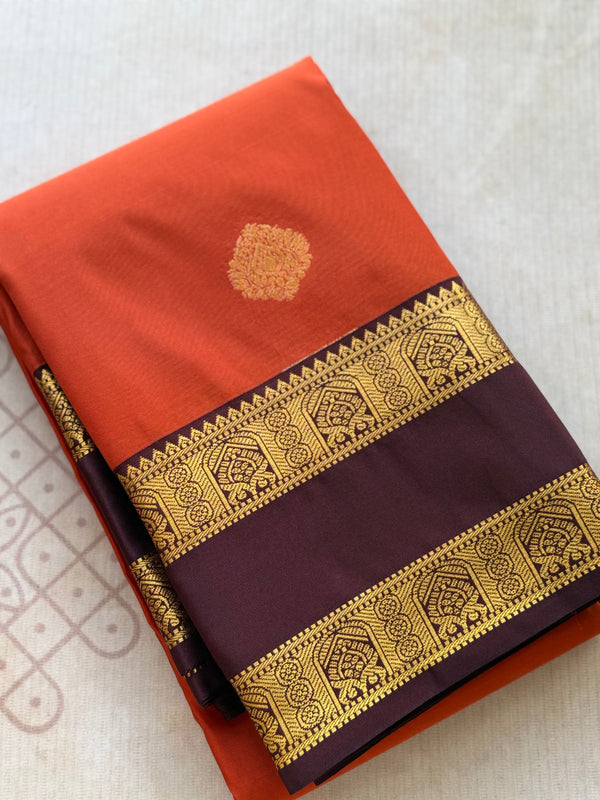 Semi Kanchi Silk Saree – Rust Orange & Deep Purple with Zari Buttas | Retta Petta Border