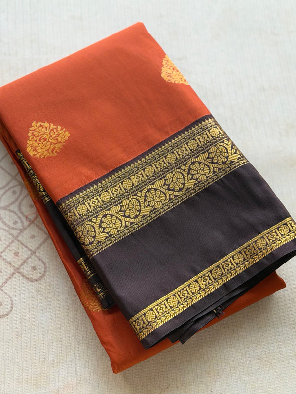 Semi Kanchi Silk Saree – Rust Orange & Deep Purple with Zari Buttas | Retta Petta Border