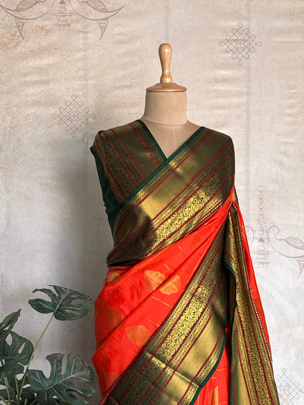 Semi Kanchi Silk Saree – Orange with Green & Gold Zari Border