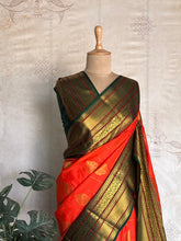 Semi Kanchi Silk Saree – Orange with Green & Gold Zari Border