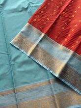 Deep Orange Semi Kanchi Silk Saree with Mint Zari Border