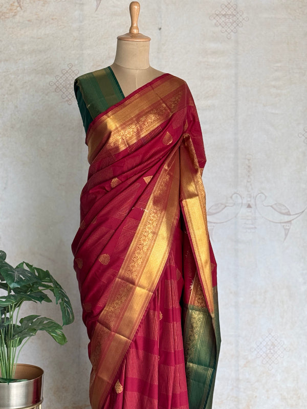 Semi Kanchi Silk Saree in Maroon with Emerald Green Contrast Border & Rich Gold Zari Weaving