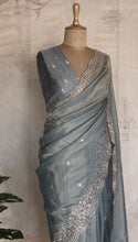 Powder Blue Soft Organza Saree with Scalloped Edges & Gold Pita Work Embroidery