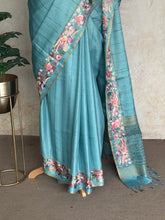 Vasantika - Aqua Blue Pure Tussar Saree with Floral Embroidered Borders
