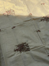 Tejas - Ivory linen saree with hand-embroidered floral & elephant buttas