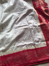 White Banarasi Silk Saree with Zari Work and Contrasting Red Border