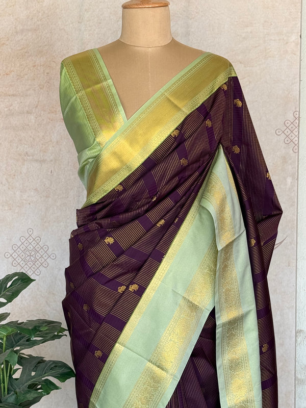 Semi Kanchi Silk Saree with Zari Lines & Buttas – Plum & Mint Elegance