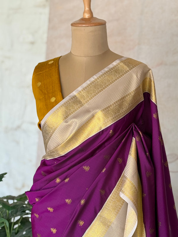 Semi Kanchi Silk Saree with Zari Buttas & Contrast Border – Purple & Mustard Elegance
