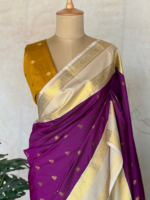 Semi Kanchi Silk Saree with Zari Buttas & Contrast Border – Purple & Mustard Elegance