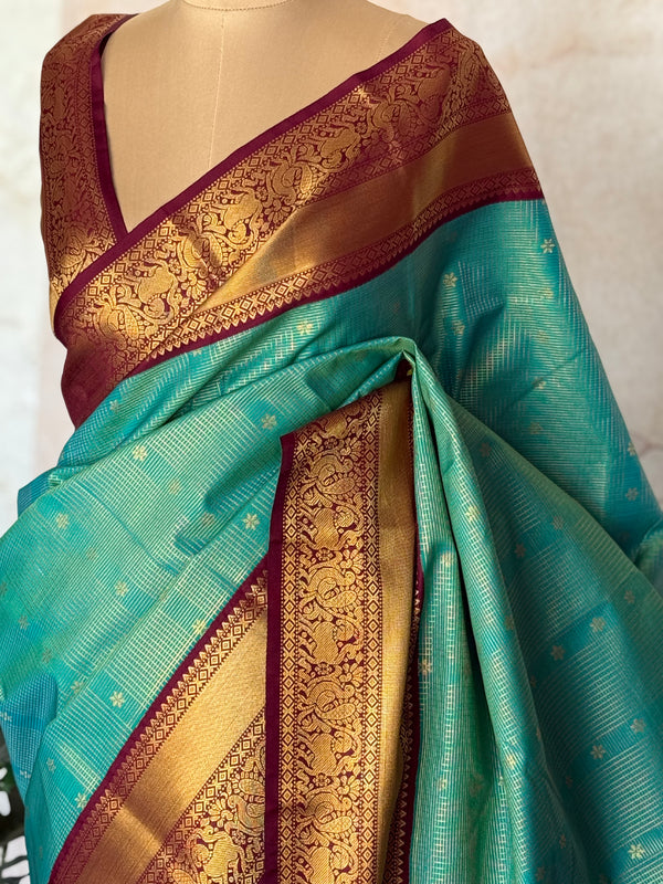 Semi Kanchi Silk Saree – Teal Green with Maroon Contrast & Traditional Kanchi Border