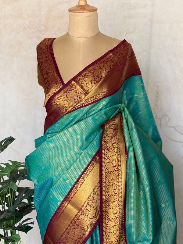 Semi Kanchi Silk Saree – Teal Green with Maroon Contrast & Traditional Kanchi Border