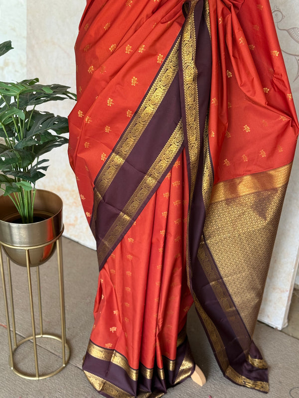 Semi Kanchi Silk Saree – Rust Orange & Deep Purple with Zari Buttas | Retta Petta Border