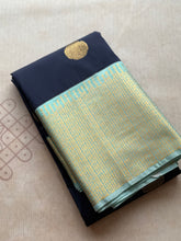 Semi Kanchi Silk Saree with Rudraksham Buttas & Zari Woven Border
