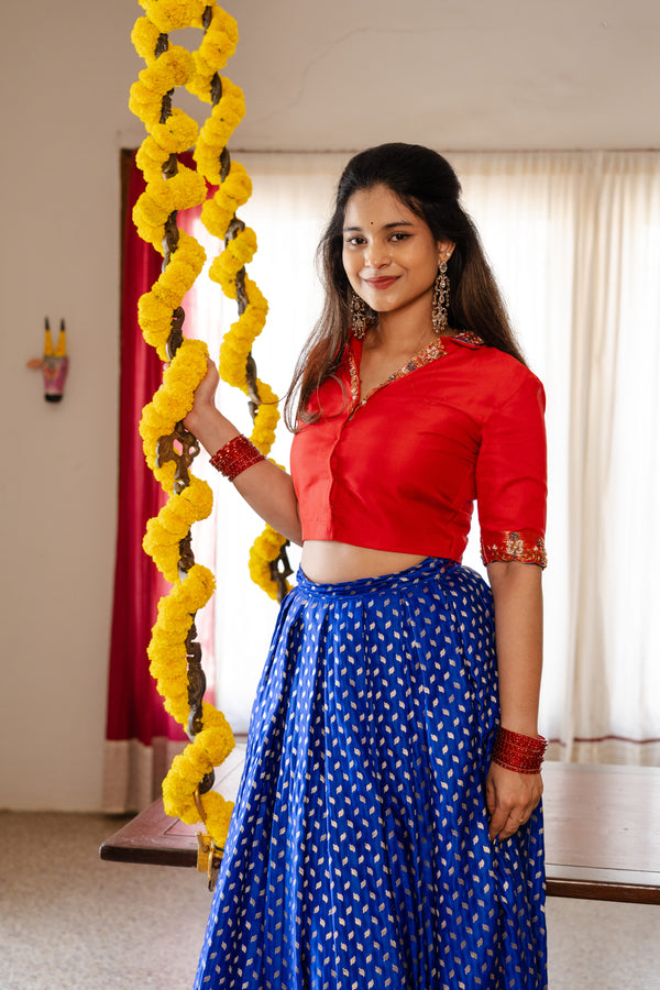 Close-up of Bhumika Top Embroidery Detailing and Earrings